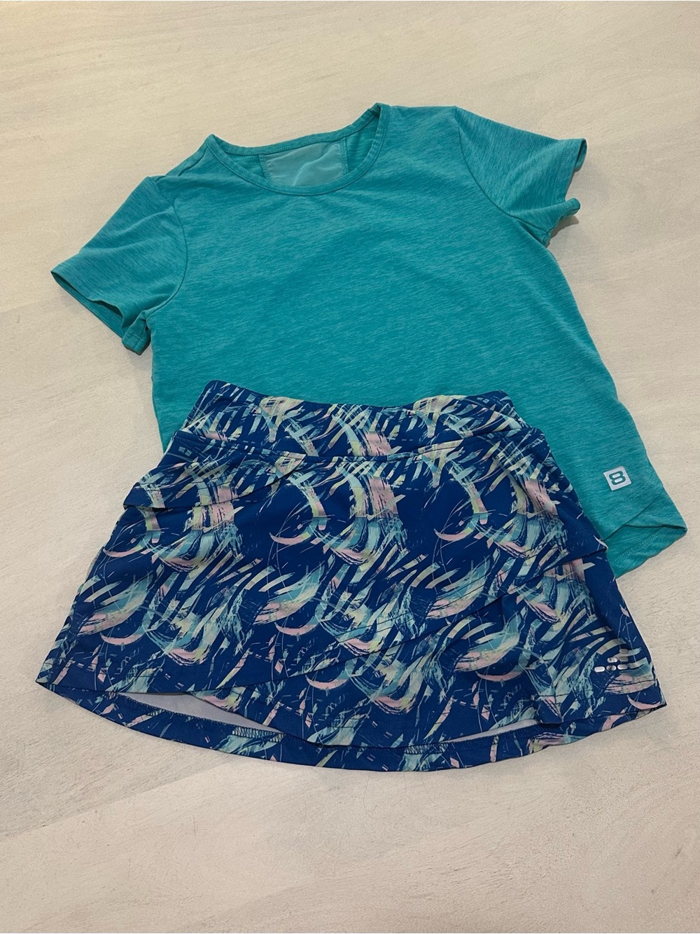 bcg. Blue Print Athletic Skort & Layers 8 Aqua short sleeve set.